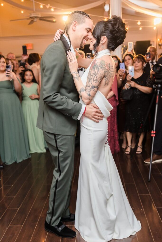 Long Island bride and groom celebrating on dance floor at Mansion at West Sayville