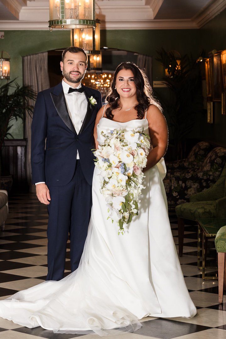 portrait of bride groom in lobby of heritage club Bethpage