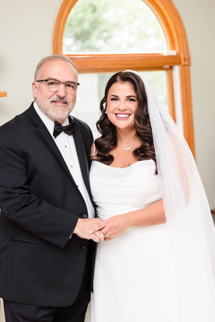 father and bride portrait in den