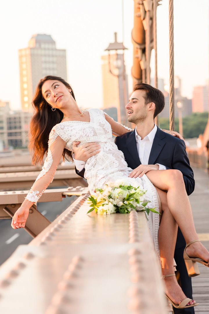 bride groom on Brooklyn bridge smiling