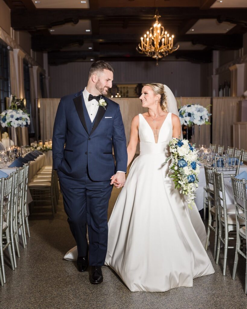 bride groom walking through reception before party at Gatsby On The Ocean