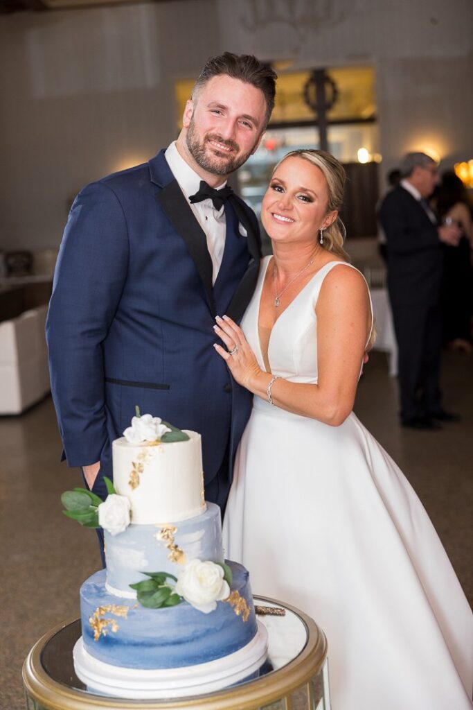 bride groom with wedding cake at Gatsby On The Ocean