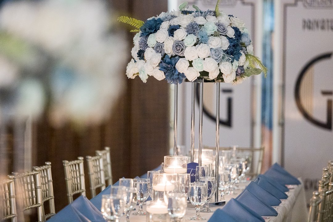 white blue flowers on table Gatsby on the Ocean