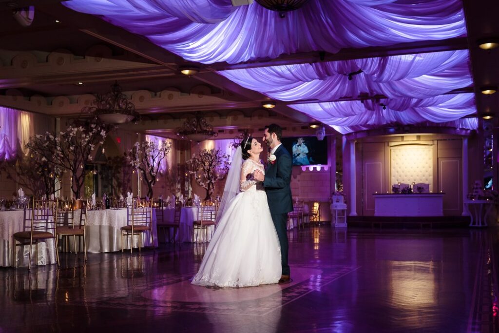 Couple enjoys a private dance together at their wedding reception.