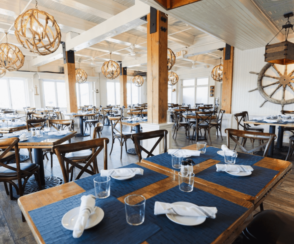 Nautical setting for a wedding reception overlooking the marina. 