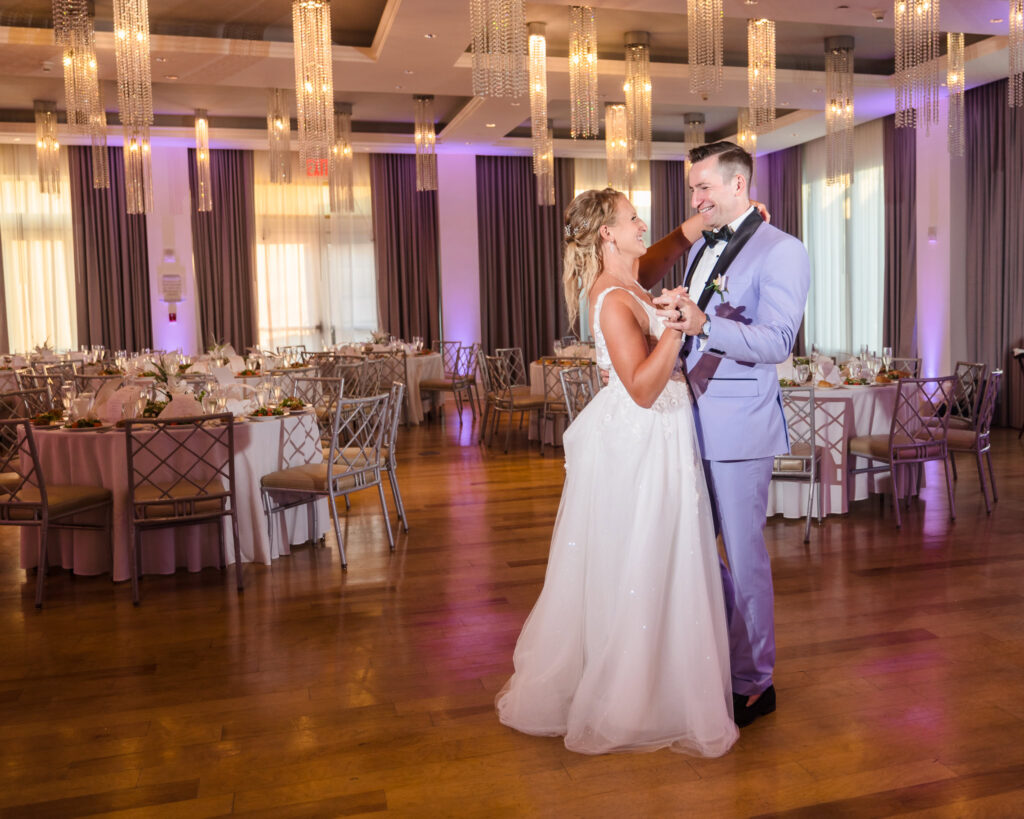 Bride and groom dancing in the ballroom of the Allegria Hotel