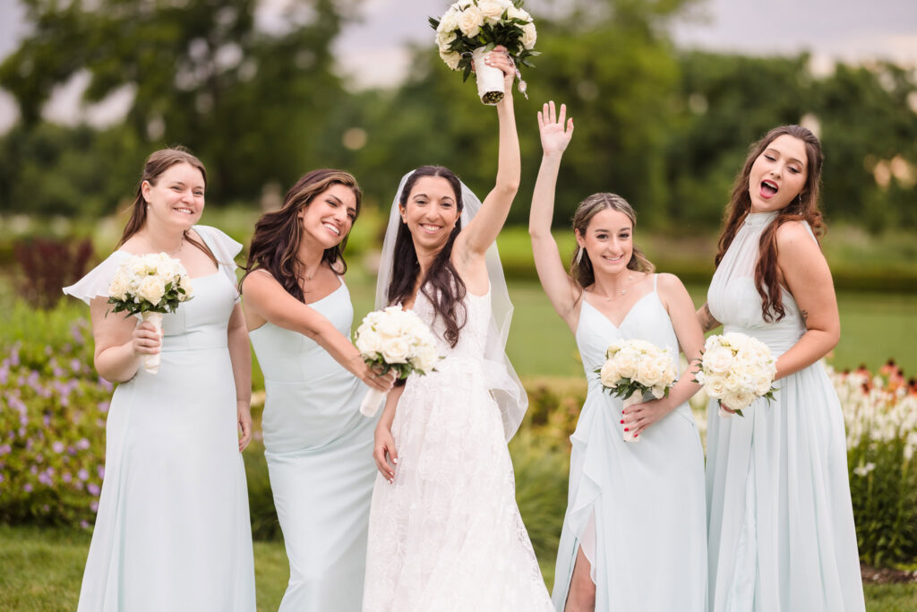 Bridesmaids dancing at Hempstead House at Sands Point Preserve