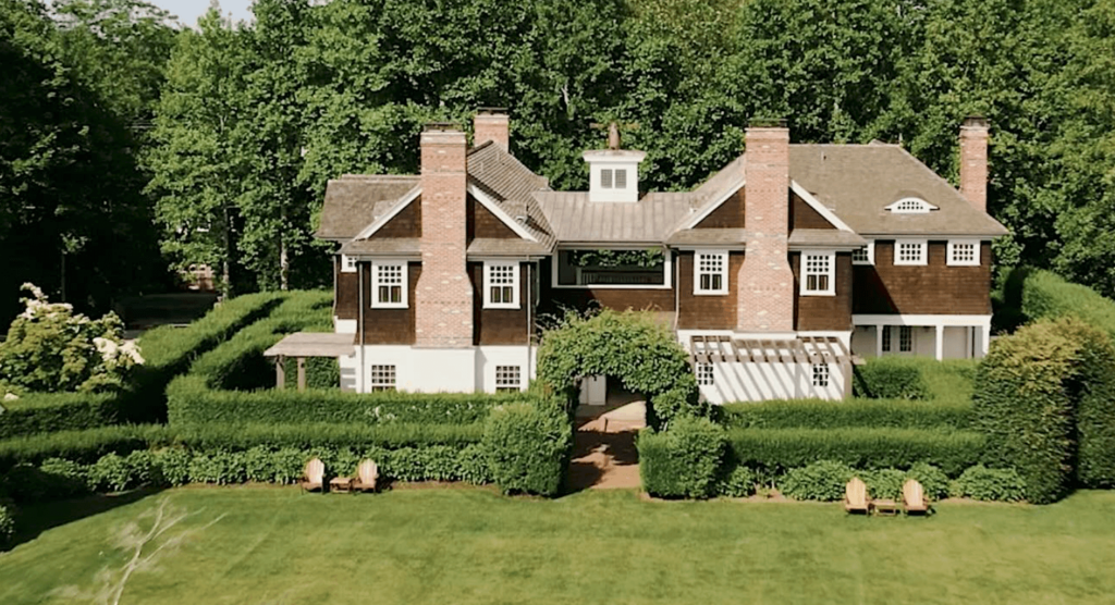 Exterior view of lush lawns and greenery at boutique Hamptons wedding venue.