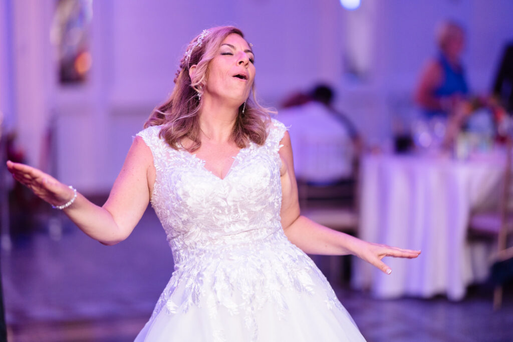 Bride dancing at Sand Castle