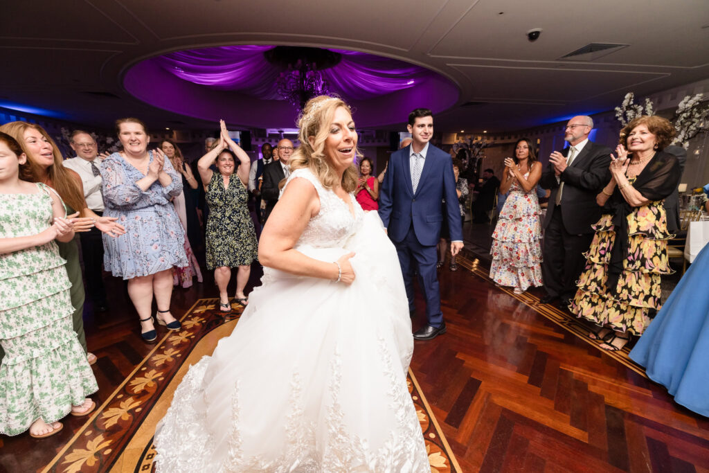 Bride dancing at Sand Castle.