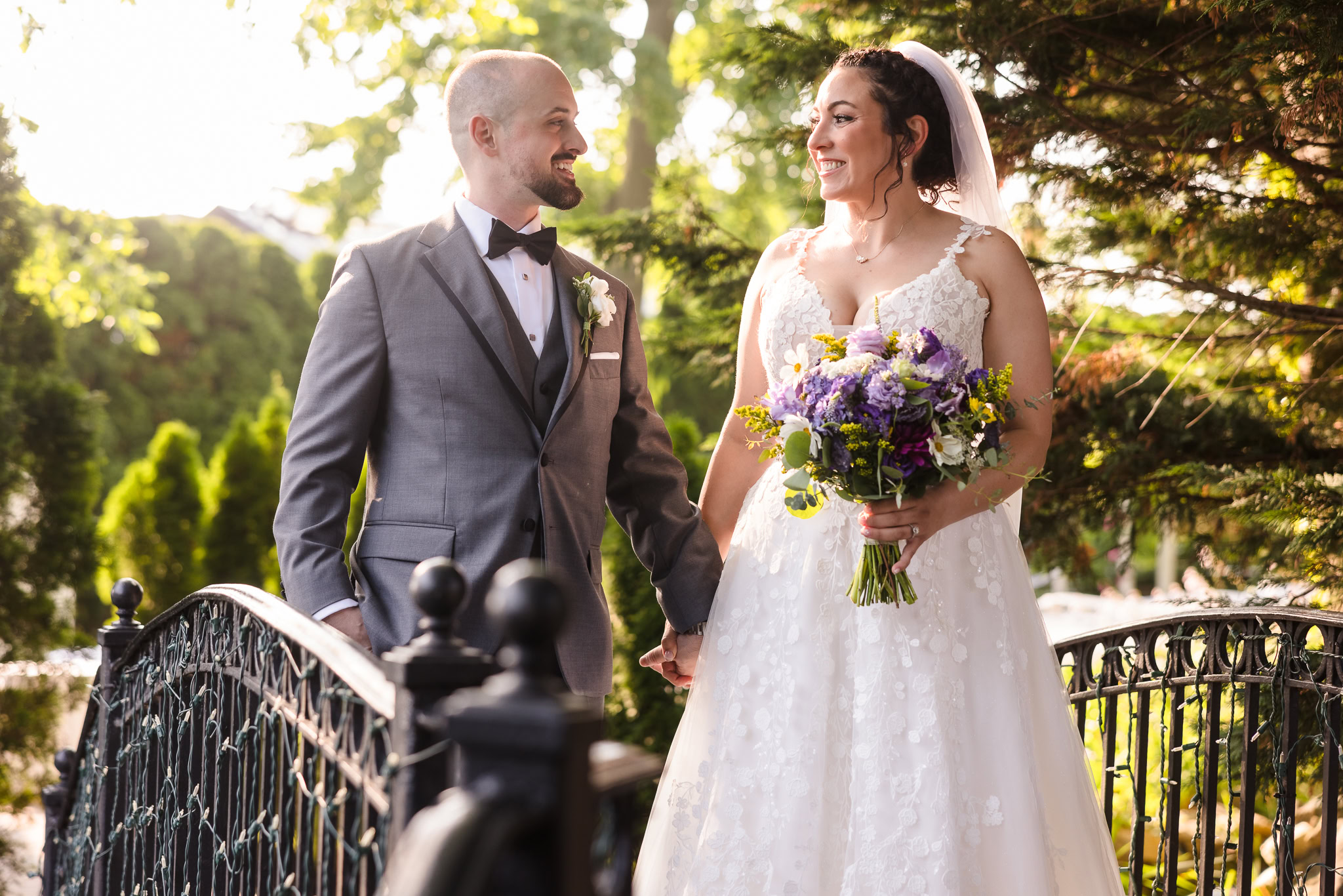 Couple on Bridge at The Fox Hollow Wedding Venue