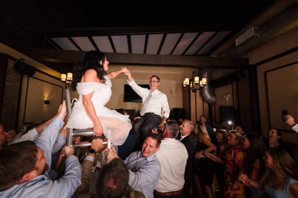 Bride and groom during Hora at JJ Coopers