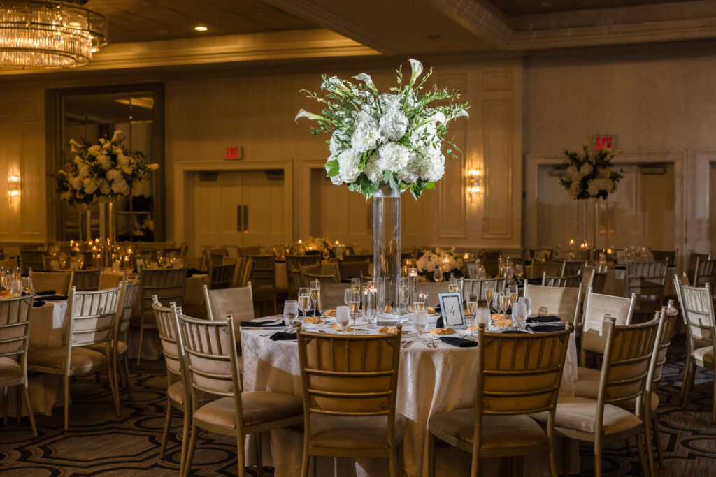 Tall centerpiece of white flowers at Glen Cove Country Club