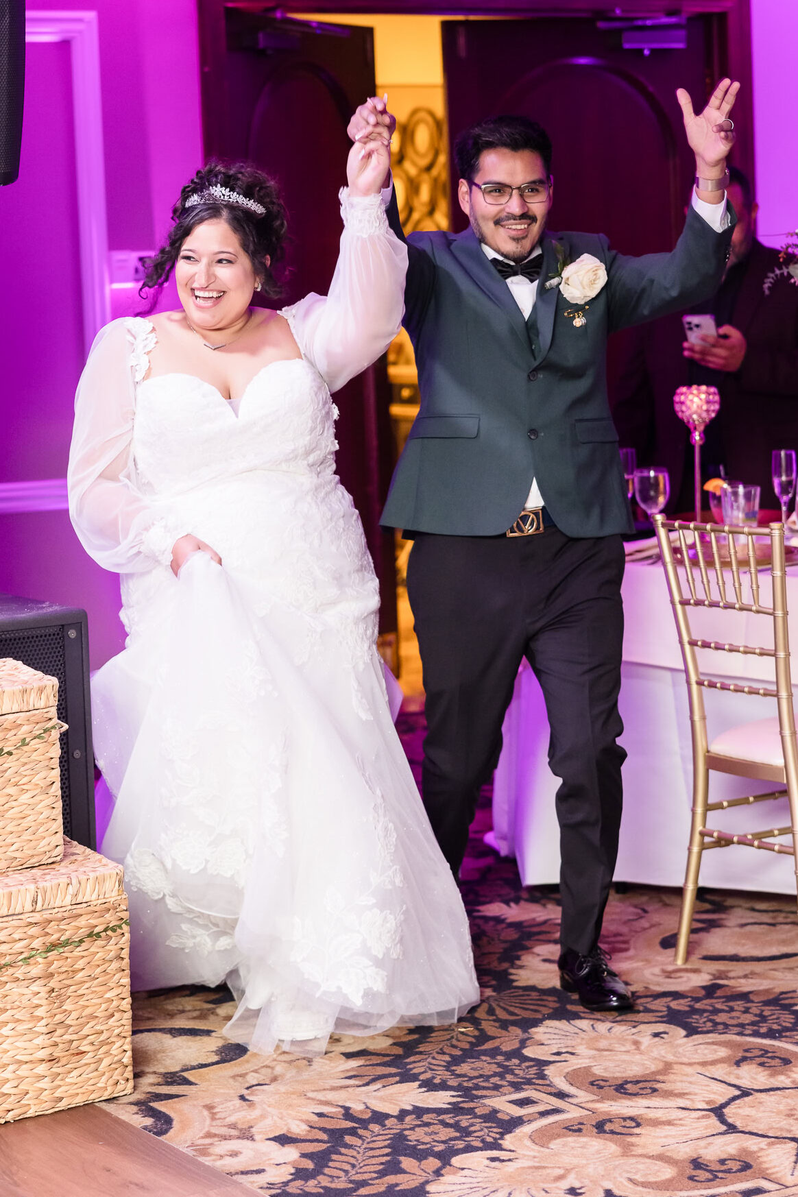 Bride and groom entering the reception at The WaterView.