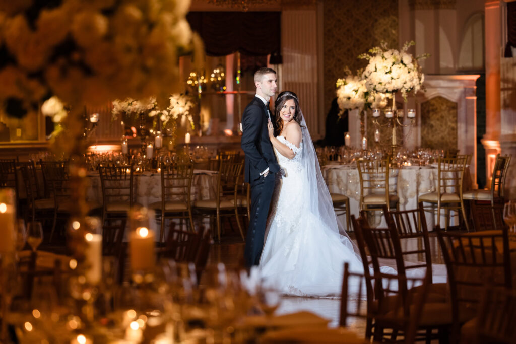 Bride and groom dancing alone in the ballroom of the Garden City Hotel. 