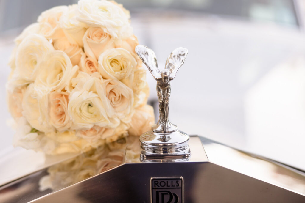 Rolls Royce hood ornament with bouquet at the Garden City Hotel.