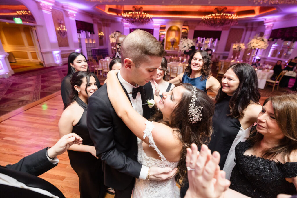 Bride and groom dancing on the dance floor at the Garden City Hotel. 