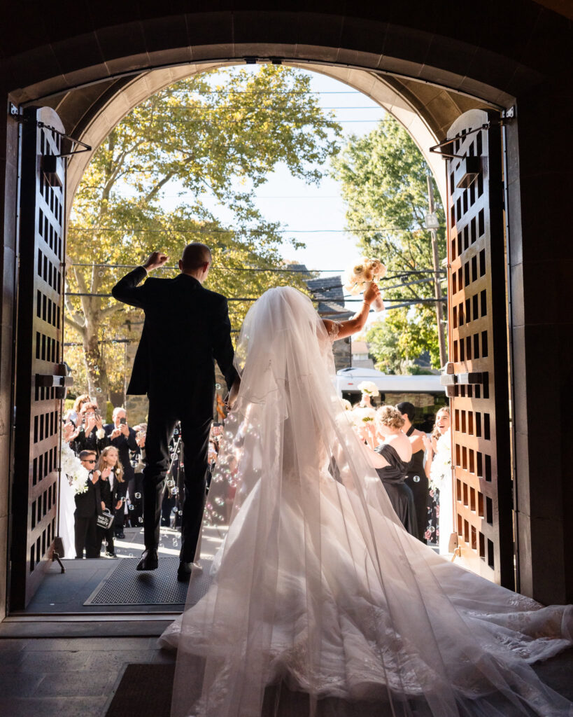 Bride and groom exiting St. Brigid's church after they got married. 