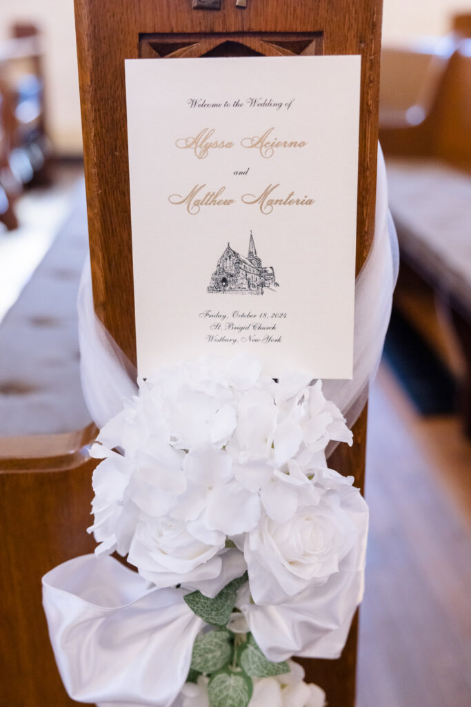 Program and white flowers from Pew Bow Rentals at St. Brigid's church.