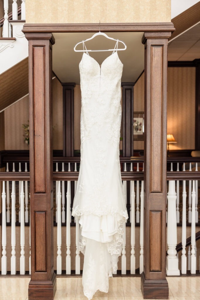 Brides dress hanging in the lobby of East Wind Long Island.