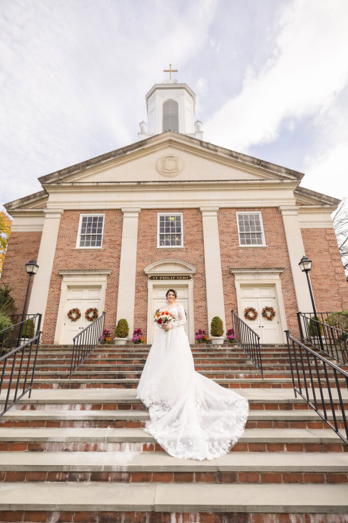 Bride walking into St. Philip Neri church 