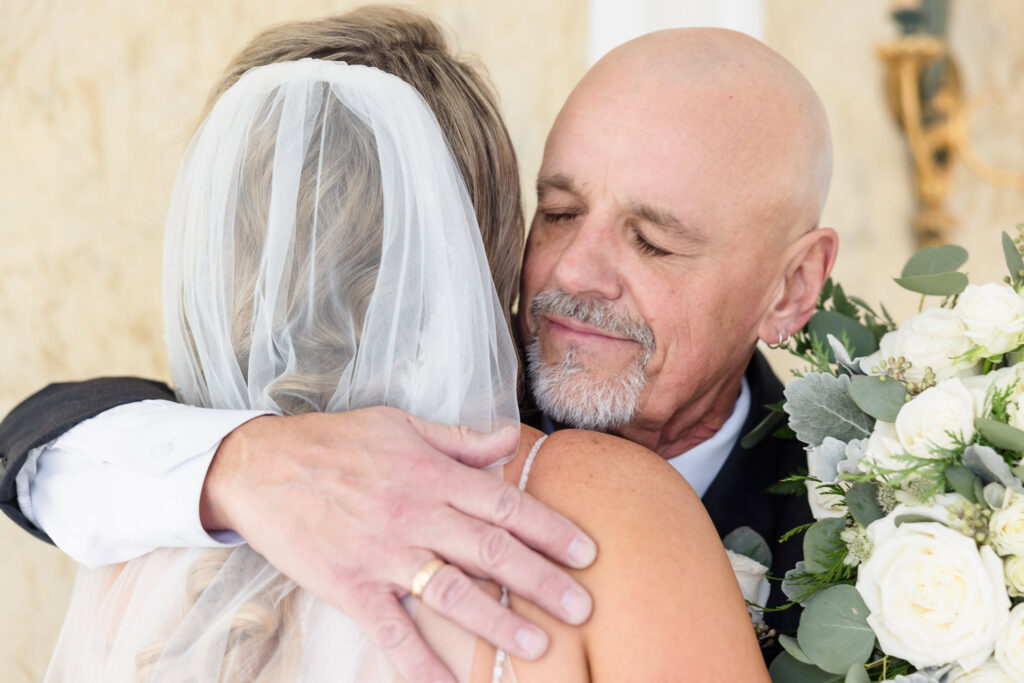 Bride having a first look with her dad. 