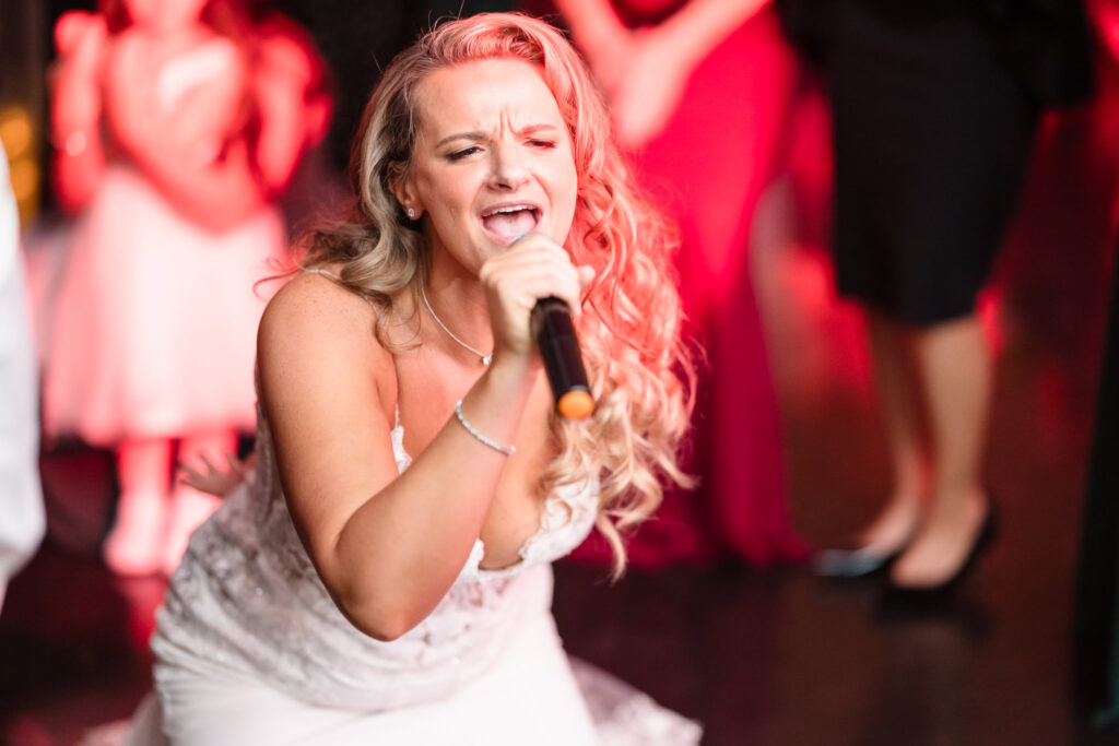 Bride singing at Stonebridge Country Club wedding. 