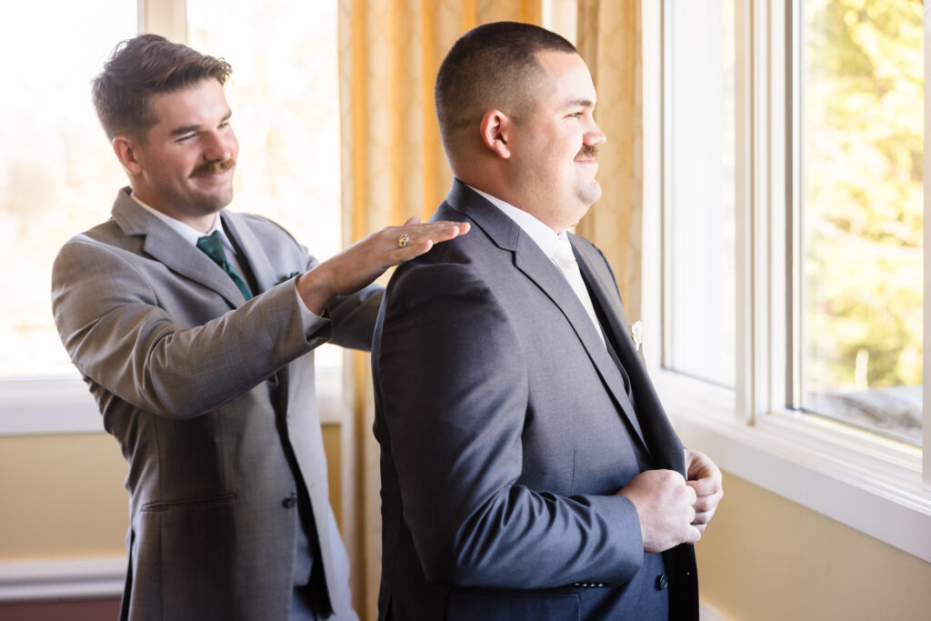 Groom getting ready with the best man.
