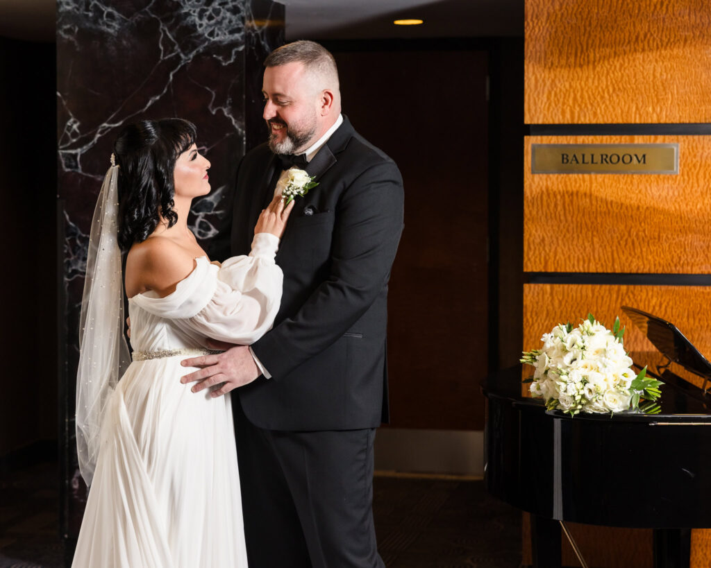 Bride and groom during first look at Inn at Great Neck.