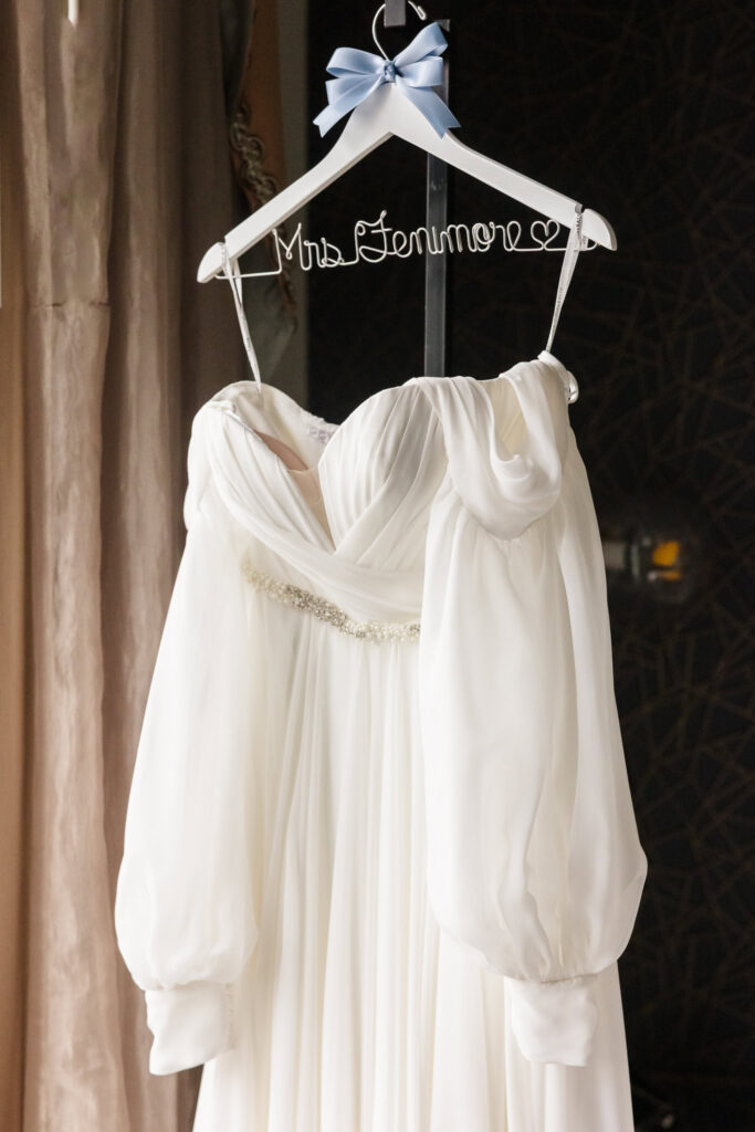 Bride's dress on hanger at Inn at Great Neck