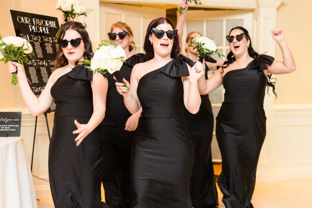 Bridesmaids entering the reception at The Inn at New Hyde Park.