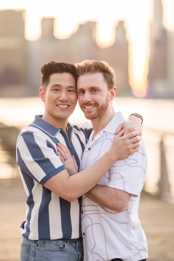 Dave and Peter pose together with joyful ease, sharing a sweet, grounded moment as soft light wraps around them.