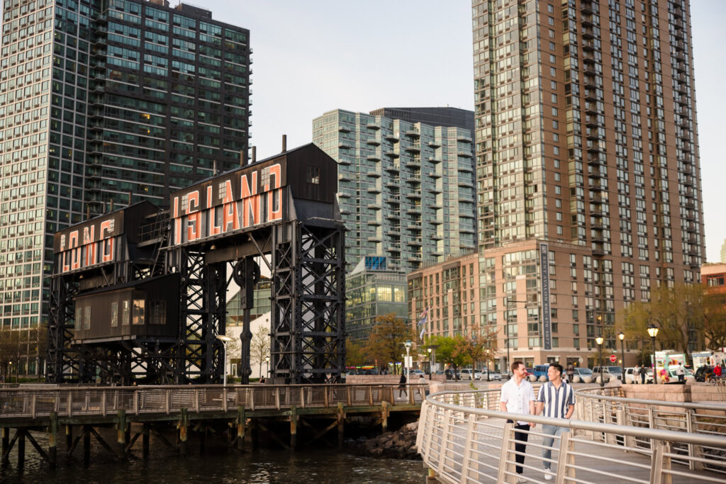 A wide cityscape view of the Gantry Plaza State Park walkway, capturing the park’s modern skyline and architectural beauty.