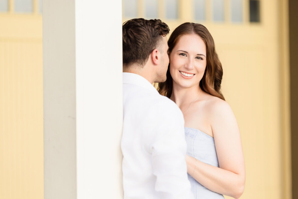 Close-up of couple sharing a laugh in soft natural light