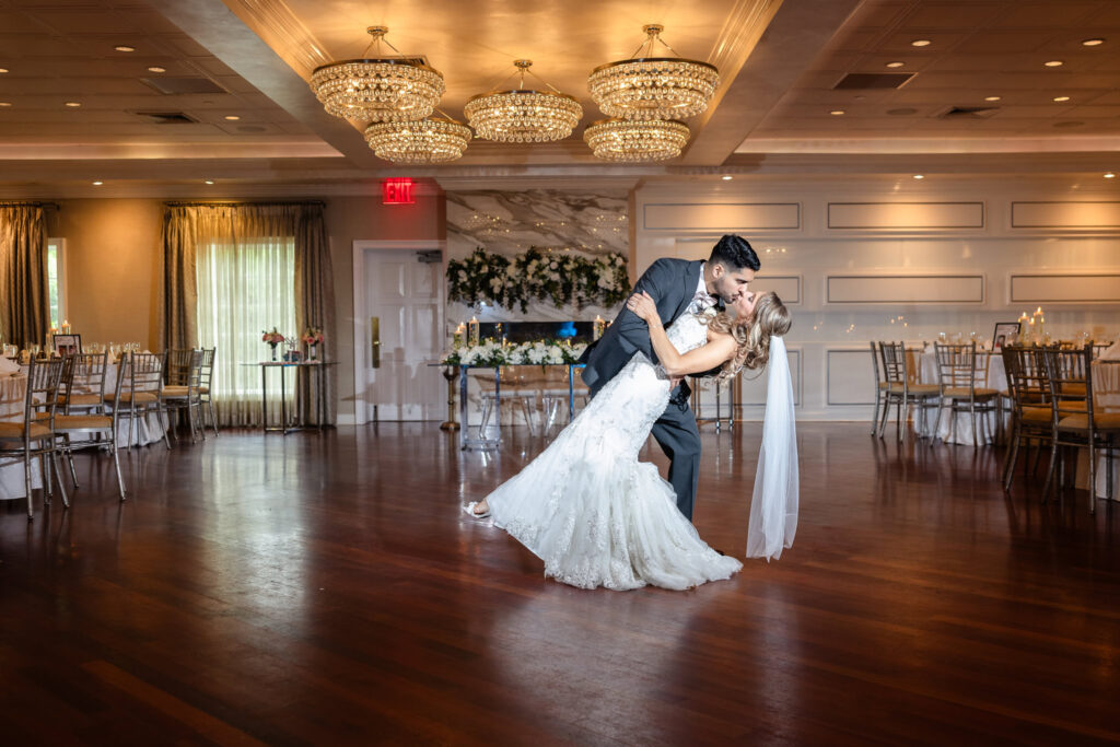 Bride and groom’s choreographed first dance in ballroom