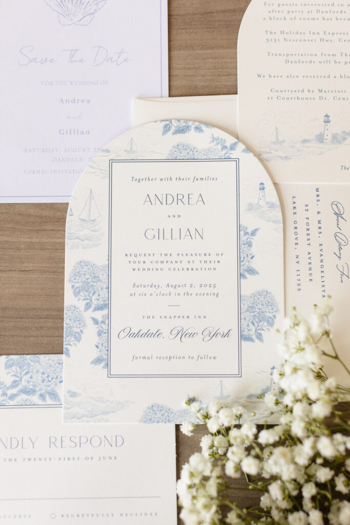 Elegant blue and white coastal-themed wedding invitation suite for Andrea and Gillian’s summer wedding at The Snapper Inn in Oakdale, New York.