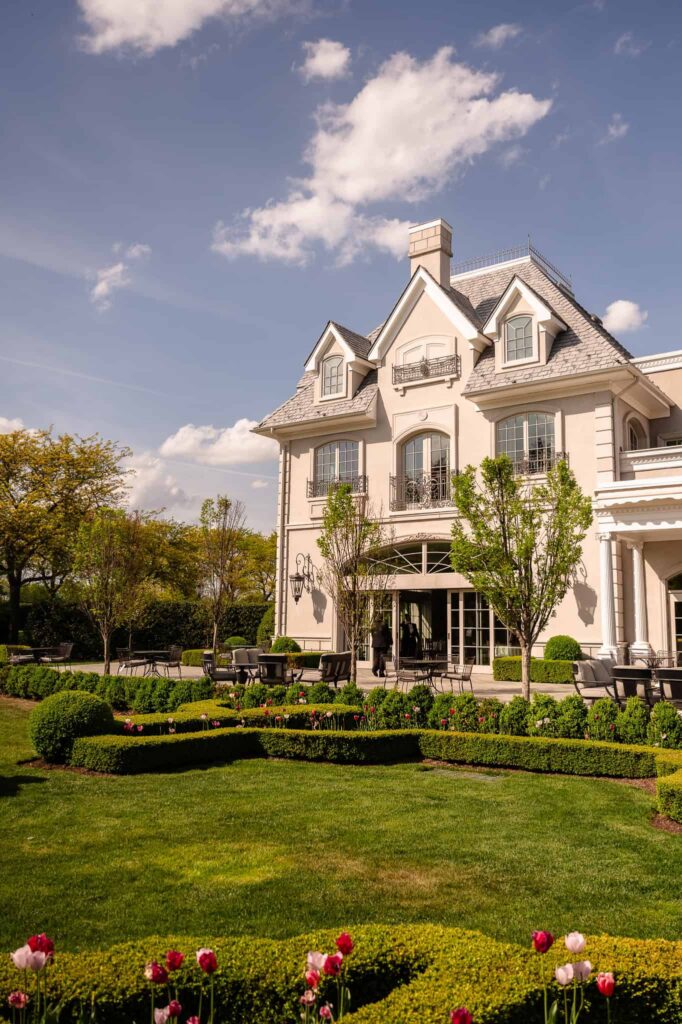 Exterior of Park Chateau Estate and Gardens in East Brunswick, NJ, featuring French-inspired architecture and manicured grounds at this luxury New Jersey wedding venue.