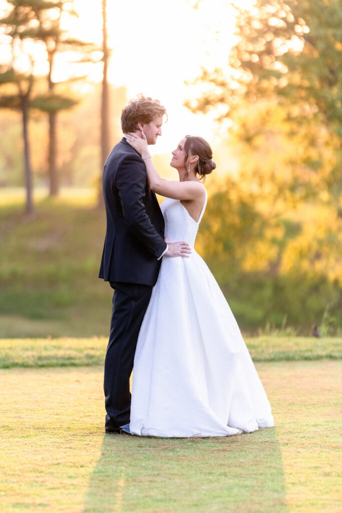 Bride and groom sharing a quiet moment during golden-hour wedding portraits on Long Island.
