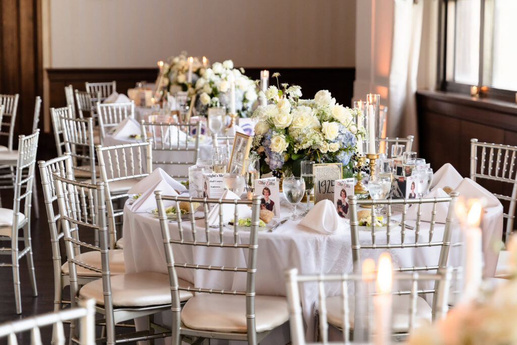 Reception tables styled with period-accurate decor and florals for a 1920s wedding on Long Island.