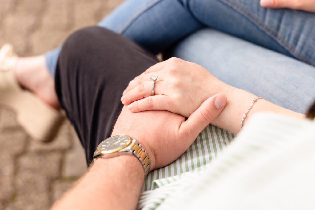 Engagement ring detail photographed during a Roosevelt Island engagement session.