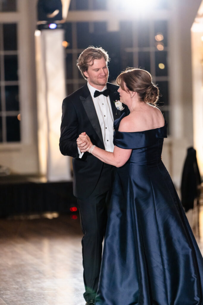 Kyle shares a mother-son dance with his mother during the wedding reception at The Heritage Club at Bethpage