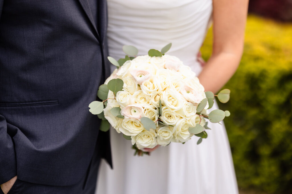 White rose bridal bouquet photographed during portraits.