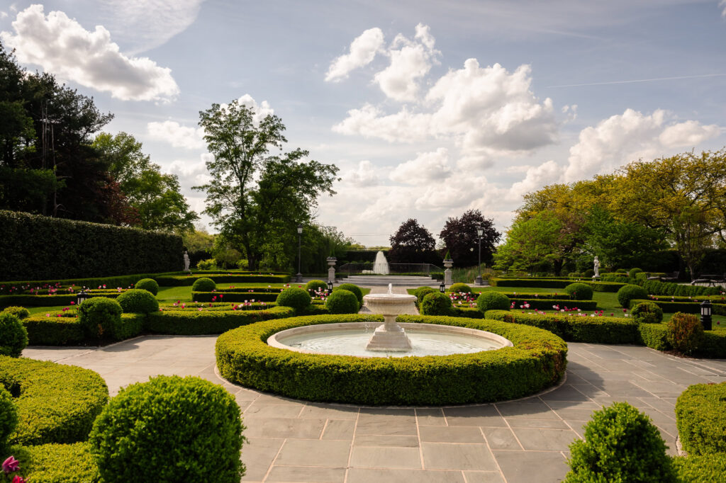 Formal gardens and fountain at Park Chateau Estate and Gardens, a popular setting for Park Chateau Wedding portraits.