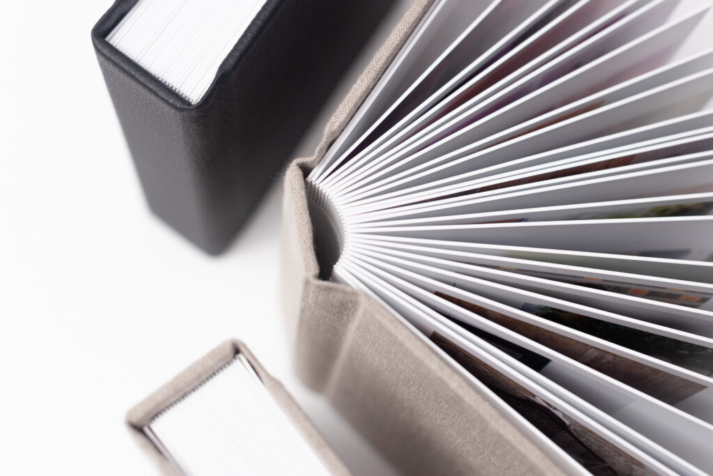 Close-up of thick layflat wedding album pages, reflecting why wedding albums matter for lasting quality and durability.