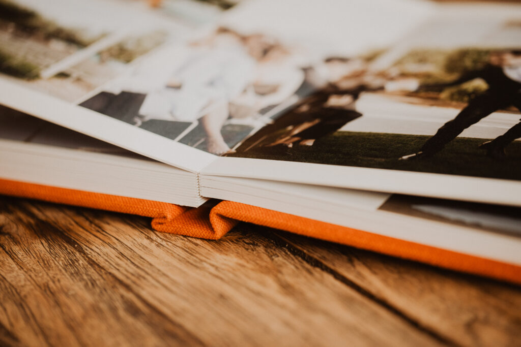 Close-up of thick layflat wedding album pages, demonstrating why wedding albums matter for creating heirlooms built to last.