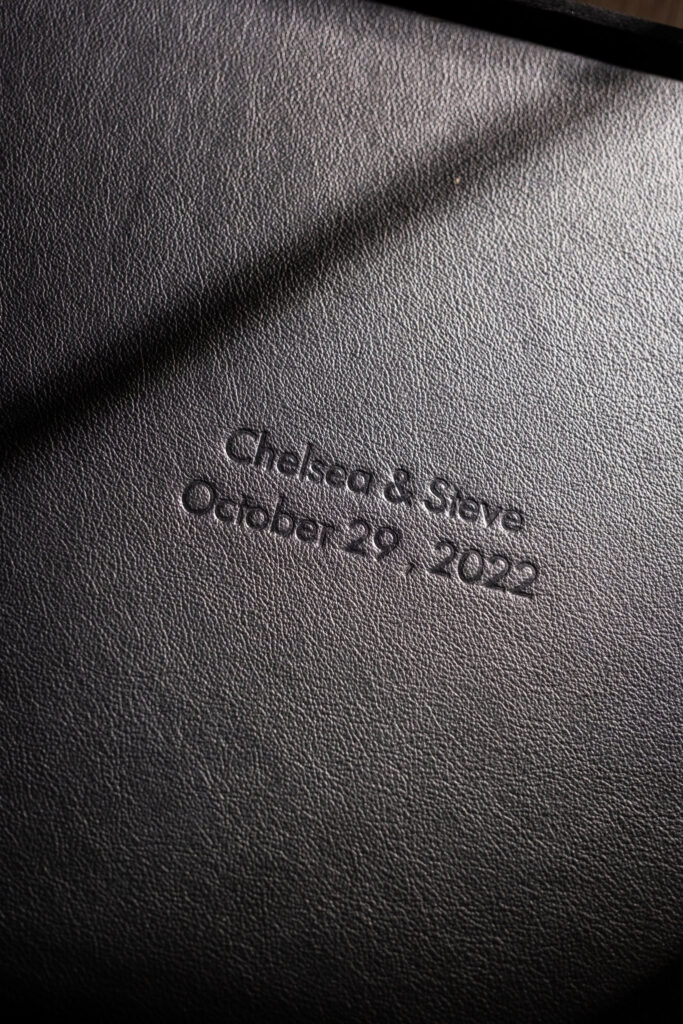 Personalized leather wedding album with embossed names and wedding date