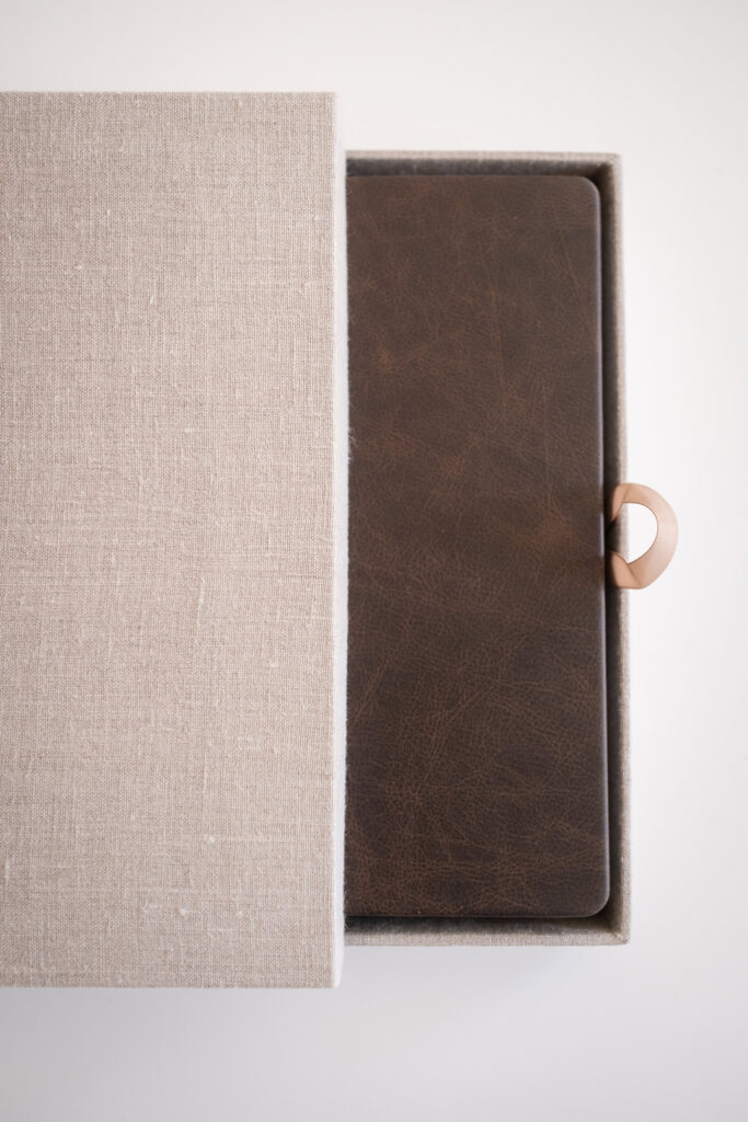 Luxury leather stored inside a linen keepsake box.