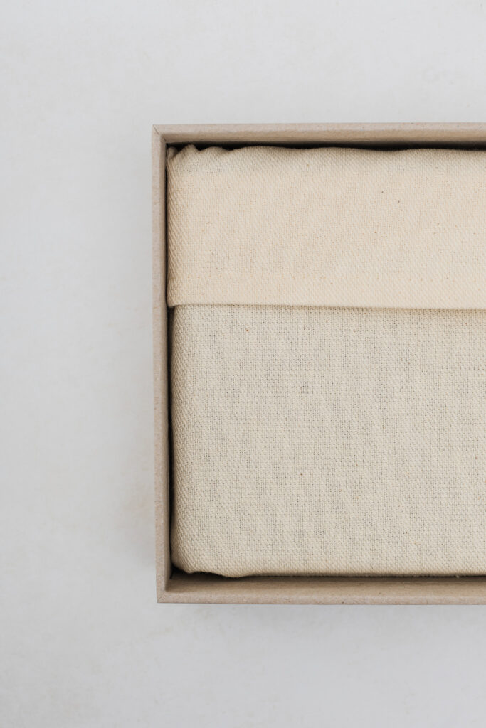 Linen stored inside an archival keepsake box.