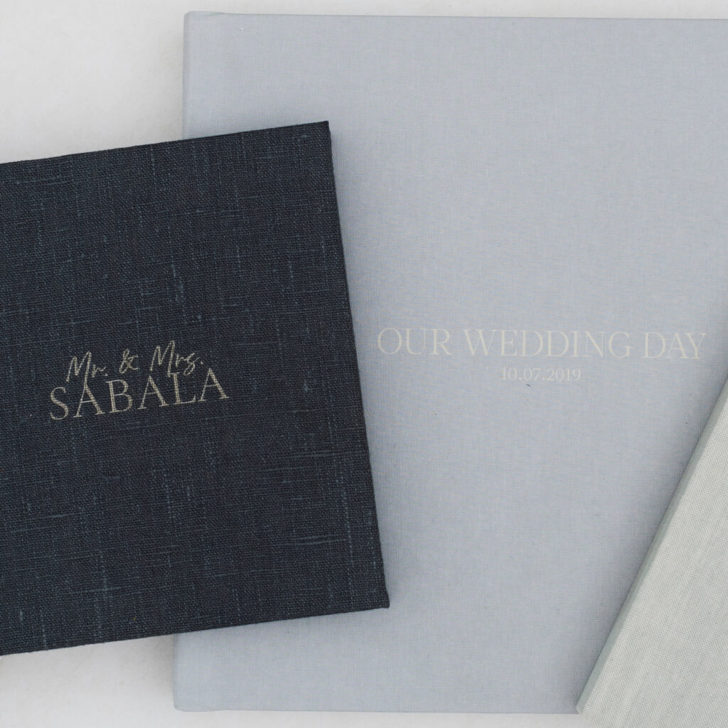 Luxury custom wedding album cover options in linen, acrylic, and fabric finishes.