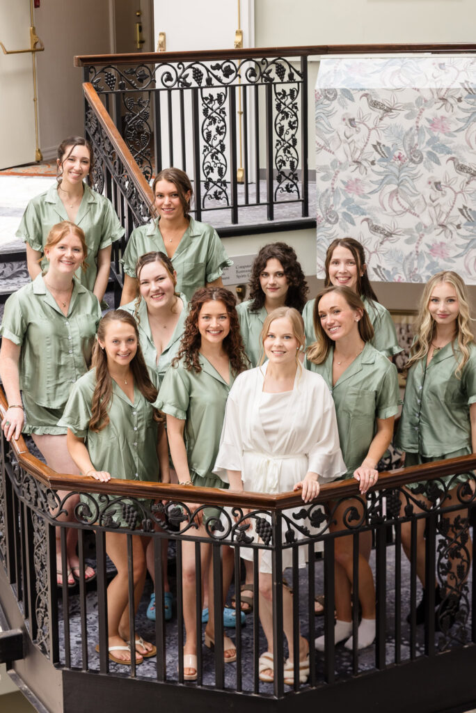 Lydia and her bridesmaids pose for a formal portrait at Tarrytown House Estate before the wedding.